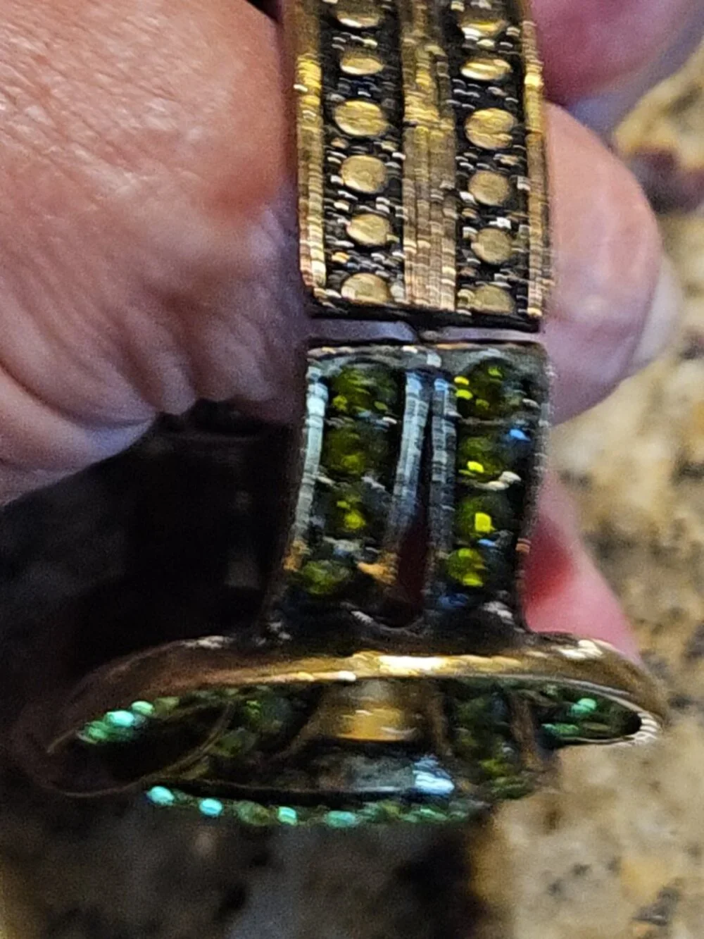 Beautiful hinged, Emerald style watch with new battery. Worned once to Wicked.